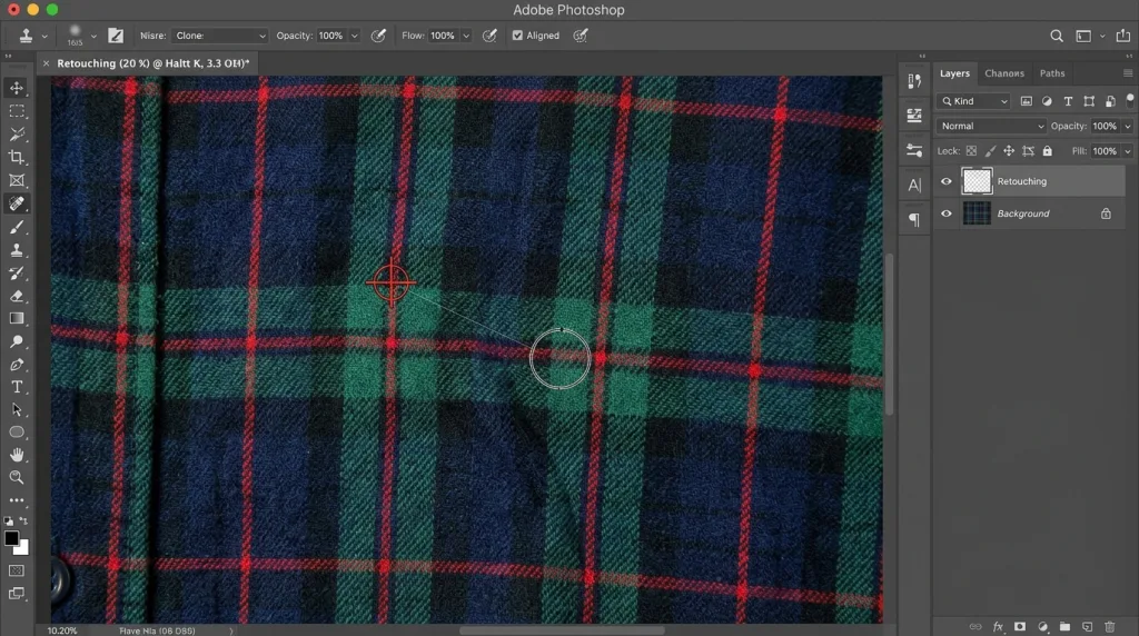 How to use the Clone Stamp tool to flawlessly remove wrinkles on striped and patterned clothing while preserving the print.
