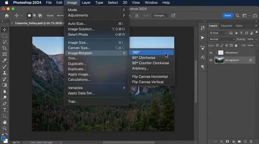 Navigating the Image Rotation dropdown menu in Adobe Photoshop to rotate the entire canvas.