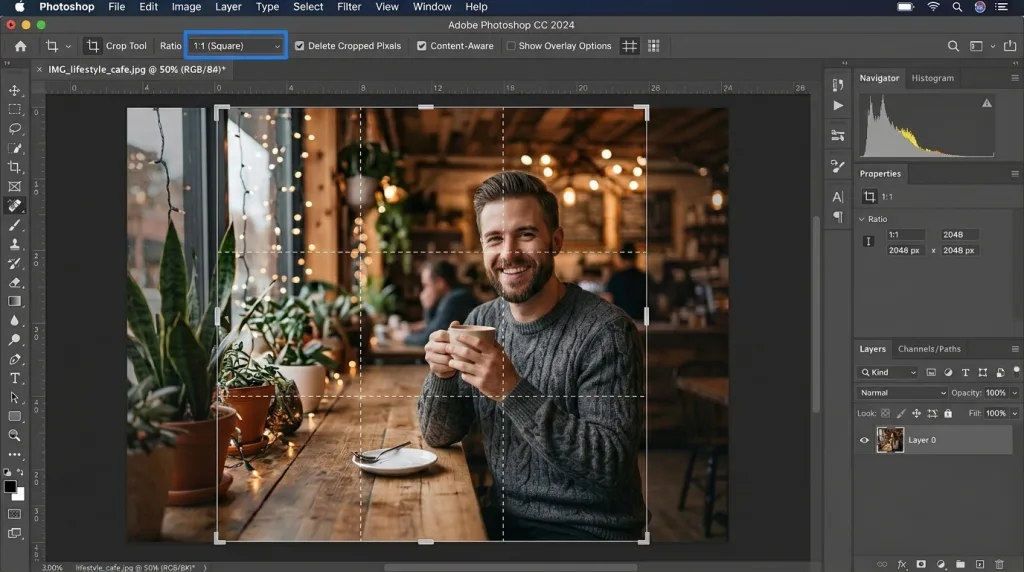 Using the Crop tool in Photoshop to resize and reframe a product image simultaneously.