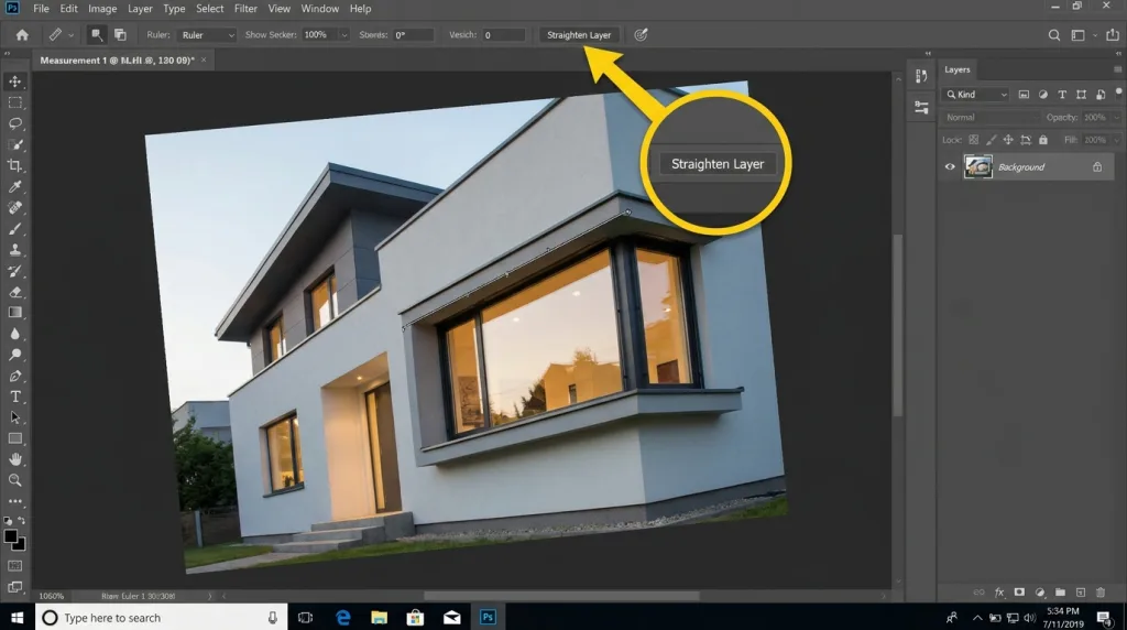 Using the Ruler tool and Straighten Layer button in Photoshop to align tilted architectural photos.